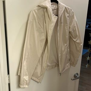 Never worn but soft on the inside, super cute rain jacket!